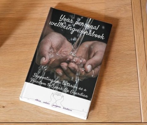 Wellbeing workbook on a table